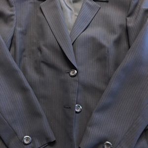 Single breast. Two button navy blue Suit.